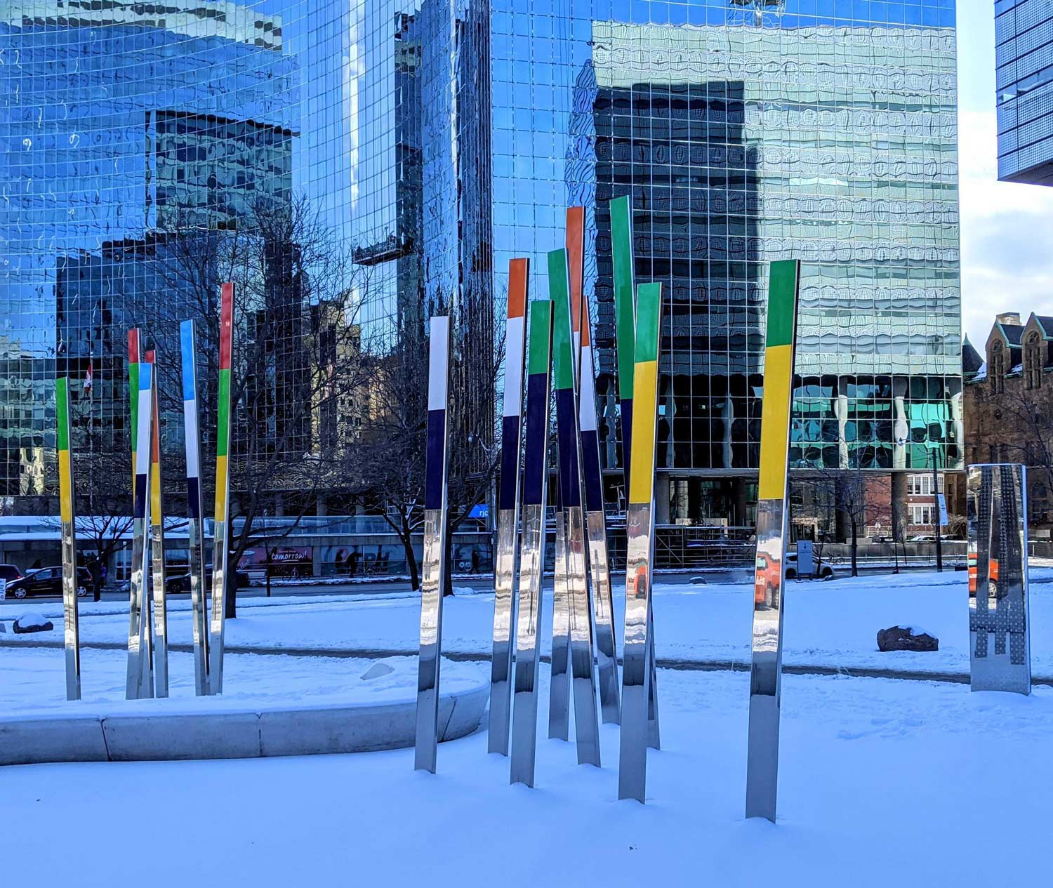 a bunch of poles that are in the snow.